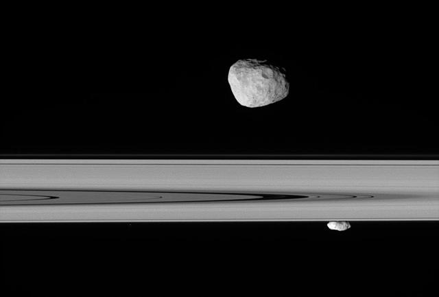 Saturn moons Janus and Prometheus look close enough to touch in this  stunningly detailed view