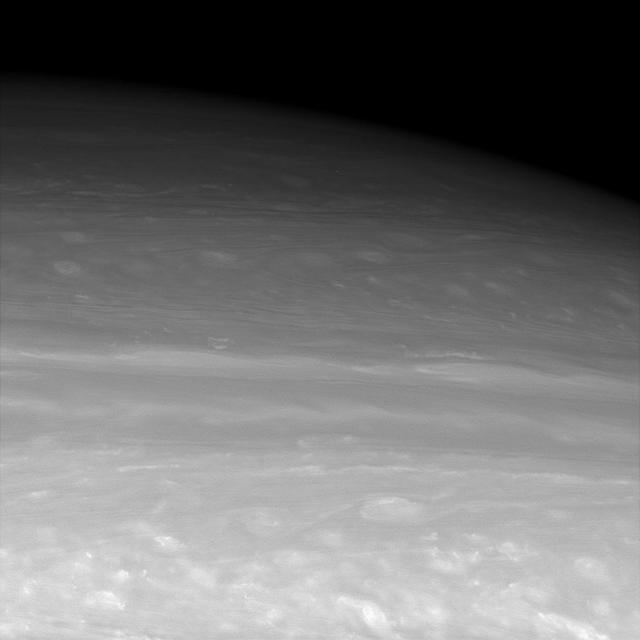 This infrared view looks toward middle to high northern latitudes on Saturn, revealing entrancing meanders in the clouds. The cloud patterns transition from puffier looking in the south -- possibly a region of shear -- to smoother oval shapes in the north