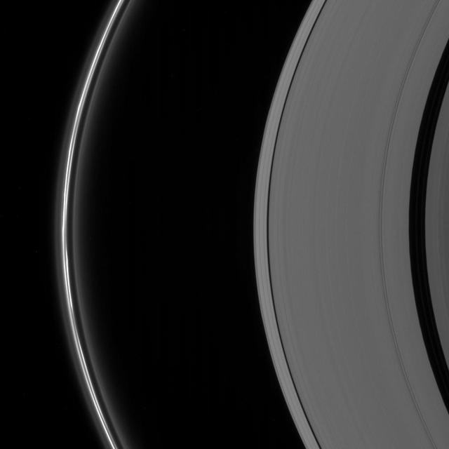 The clumpy disturbed appearance of the brilliant F ring constantly changes. The irregular structure of the ring is due, in large part, to the gravitational perturbations on the ring material by one of Saturn moons, Prometheus