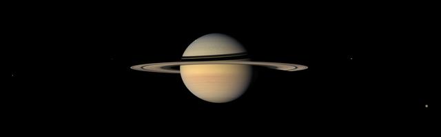 While on final approach for its Sept. 2007 close encounter with Saturn moon Iapetus, NASA Cassini spacecraft spun around to take in a sweeping view of the Saturn System.
