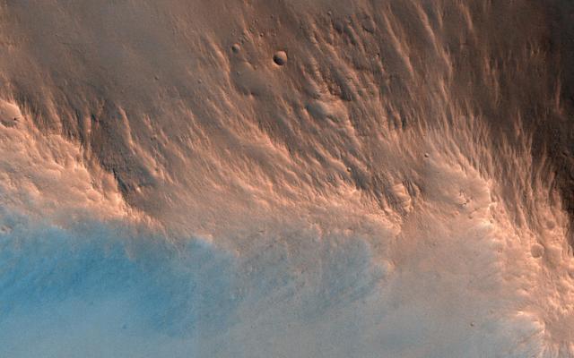 NASA image: A Nine Kilometer Impact Crater and Its Central Peak