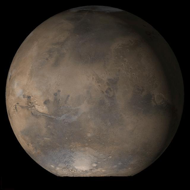 This picture is a composite of MOC daily global images acquired at Ls 53° during a previous Mars year. This month, Mars looks similar, as Ls 53° occurs in mid-May 2006. The picture shows the Acidalia/Mare Erythraeum face of Mars