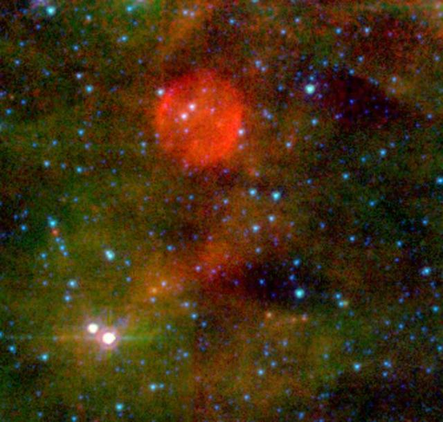 NASA Spitzer Space Telescope caught a glimpse of the Cepheus constellation, thirty thousand light-years away; astronomers think theyve found a massive star whose death barely made a peep. 