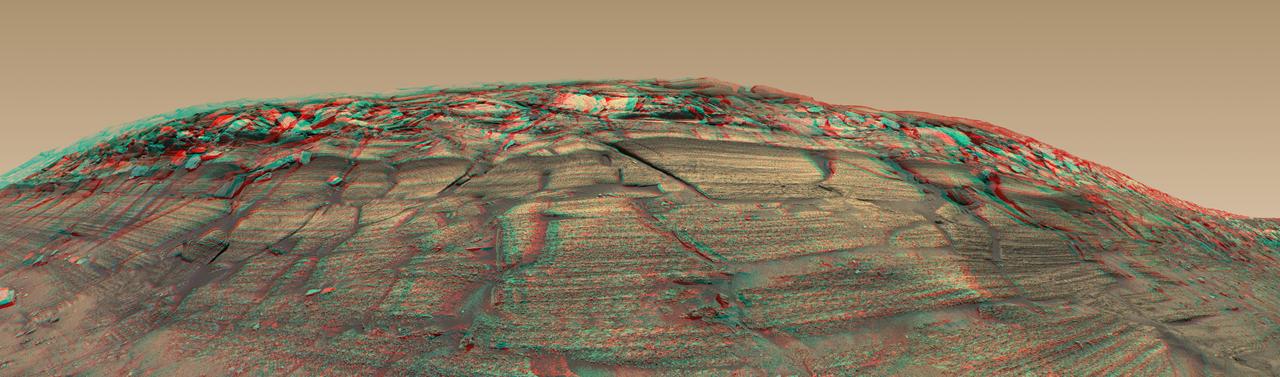 NASA Mars Exploration Rover Opportunity captured a sweeping stereo image of Burns Cliff after driving right to the base of this southeastern portion of the inner wall of Endurance Crater in November 2004. 3D glasses are necessary to view this image.