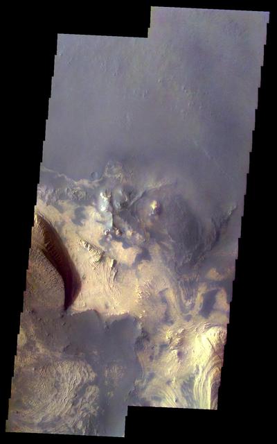 This two-image mosaic shows part of the floor of Melas Chasma