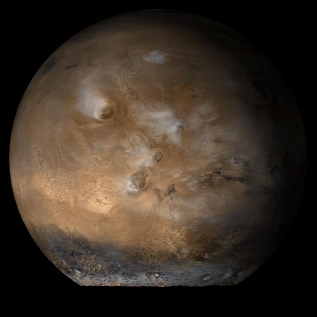 This picture is a composite of Mars Global Surveyor MGS Mars Orbiter Camera MOC daily global images acquired at Ls 93° during a previous Mars year.of the Tharsis face of Mars
