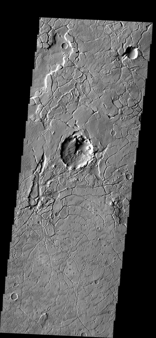 The arcuate fractures seen in this image are common along the highland/lowland boundary