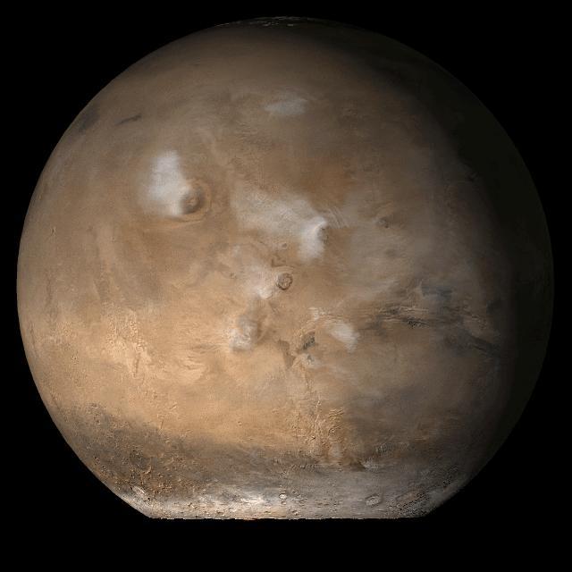 This picture is a composite of Mars Global Surveyor MGS Mars Orbiter Camera MOC daily global images acquired at Ls 93° of the Tharsis face during a previous Mars year