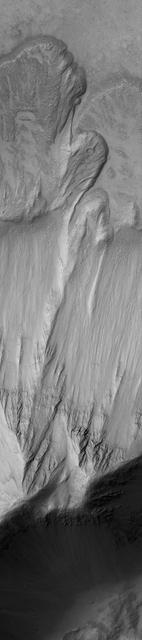 This MOC image shows a landslide that occurred off of a steep slope in Tithonium Chasma, part of the vast Valles Marineris trough system