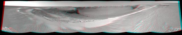 NASA Mars rover Opportunity edged closer to the top of the Duck Bay alcove along the rim of Victoria Crater overnight Sept. 27 to Sept. 28, and gained this vista of the crater. 3D glasses are necessary to view this image.