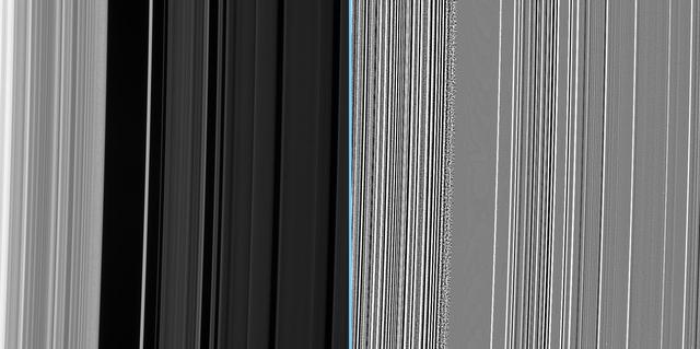 An extreme enhancement of the original image, presented at right, reveals the grainy region with greater clarity