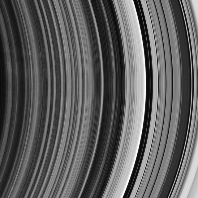 This ringscape shows the outermost part of the rings spoke-forming region, the other edge of the B ring, and the regular bands of material within the Cassini Division