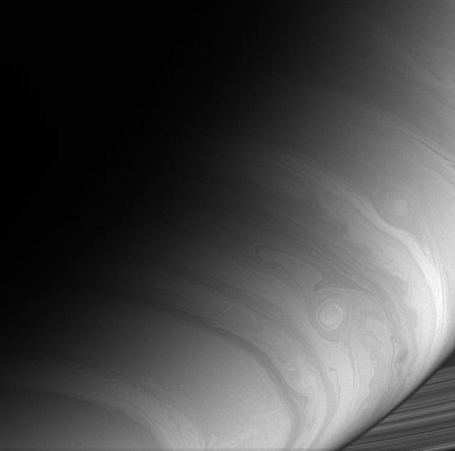 The Cassini spacecraft captures the ripples, loops and storms that swirl in Saturn east-west flowing cloud bands
