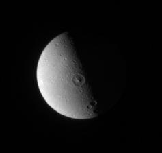 Dione leading hemisphere appears relatively smooth and placid here, compared to the fractured landscape on its trailing hemisphere
