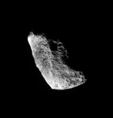 Chaotically tumbling and seriously eroded by impacts, Hyperion is one of Saturn more unusual satellites. Scientists believe the moon to be quite porous, with a great deal of its volume being empty space
