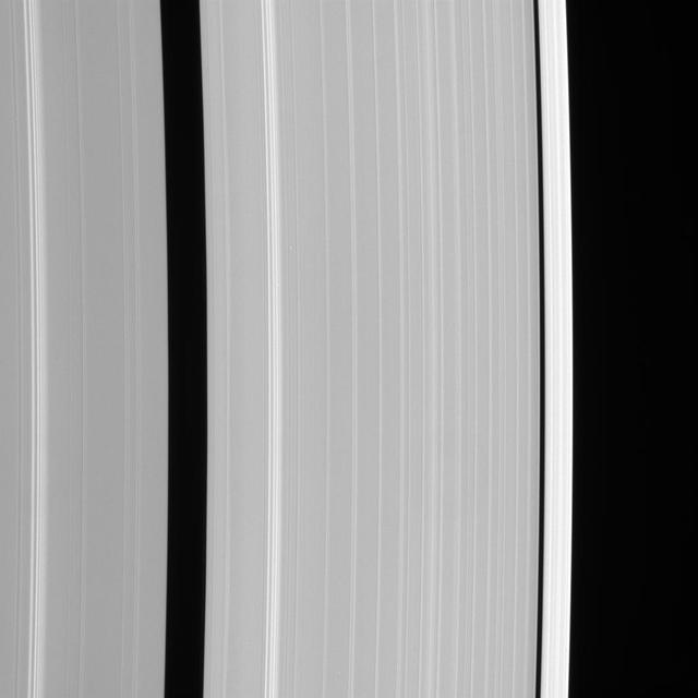 This Cassini spacecraft view shows details of Saturn outer A ring, including the Encke and Keeler gaps. The A ring brightens substantially outside the Keeler Gap