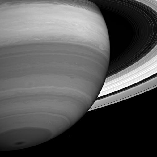 Storms and cloud bands emerge from beneath Saturn obscuring hazes in this infrared view