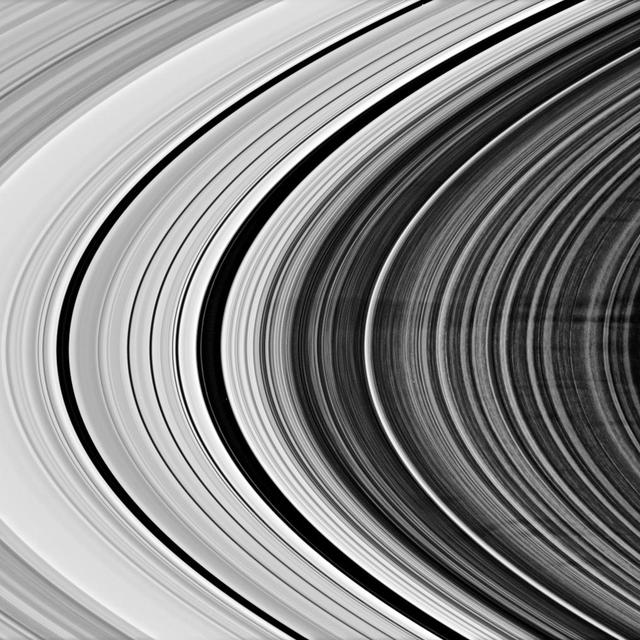 This Cassini spacecraft view shows a group of more than a dozen spokes in Saturn outer B ring. The B ring displays the azimuthal asymmetry, or variation with longitude around the planet, that is characteristic of the spoke-forming region