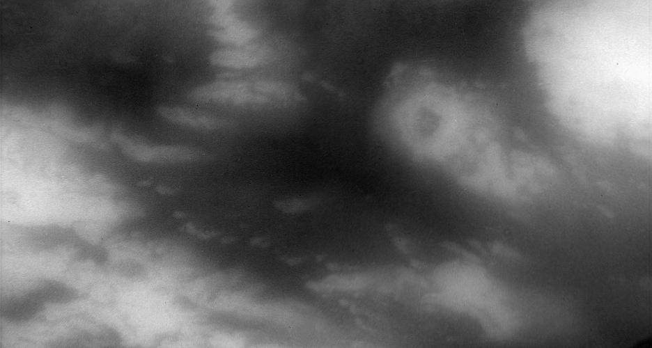 This view of Titan surface highlights northwestern Shangri-la -- a large, equatorial dark region revealed by radar observations to be covered in longitudinal dune fields