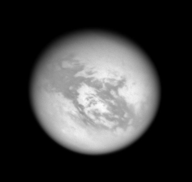 Within the windswept wastes of Titan equatorial dune desert lies the 1,700-km 1,050-mi wide bright region called Adiri, seen here at center. The intrepid Huygens probe landed off the northeastern edge of Adiri in January 2005