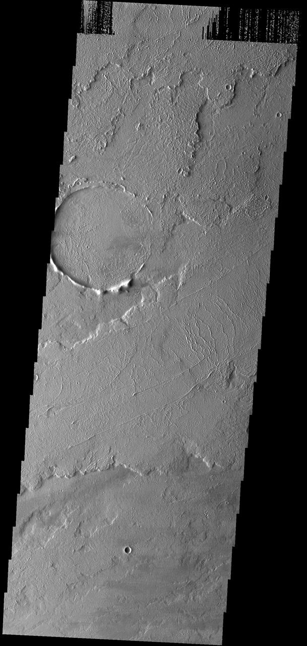 These lava flows are located to the northeast of Tharsis Tholus