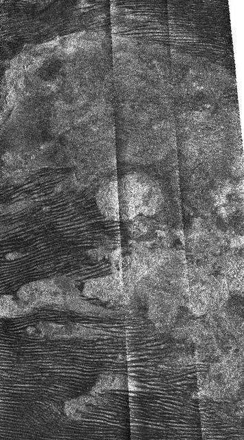 NASA image: Titan Features and Interactions