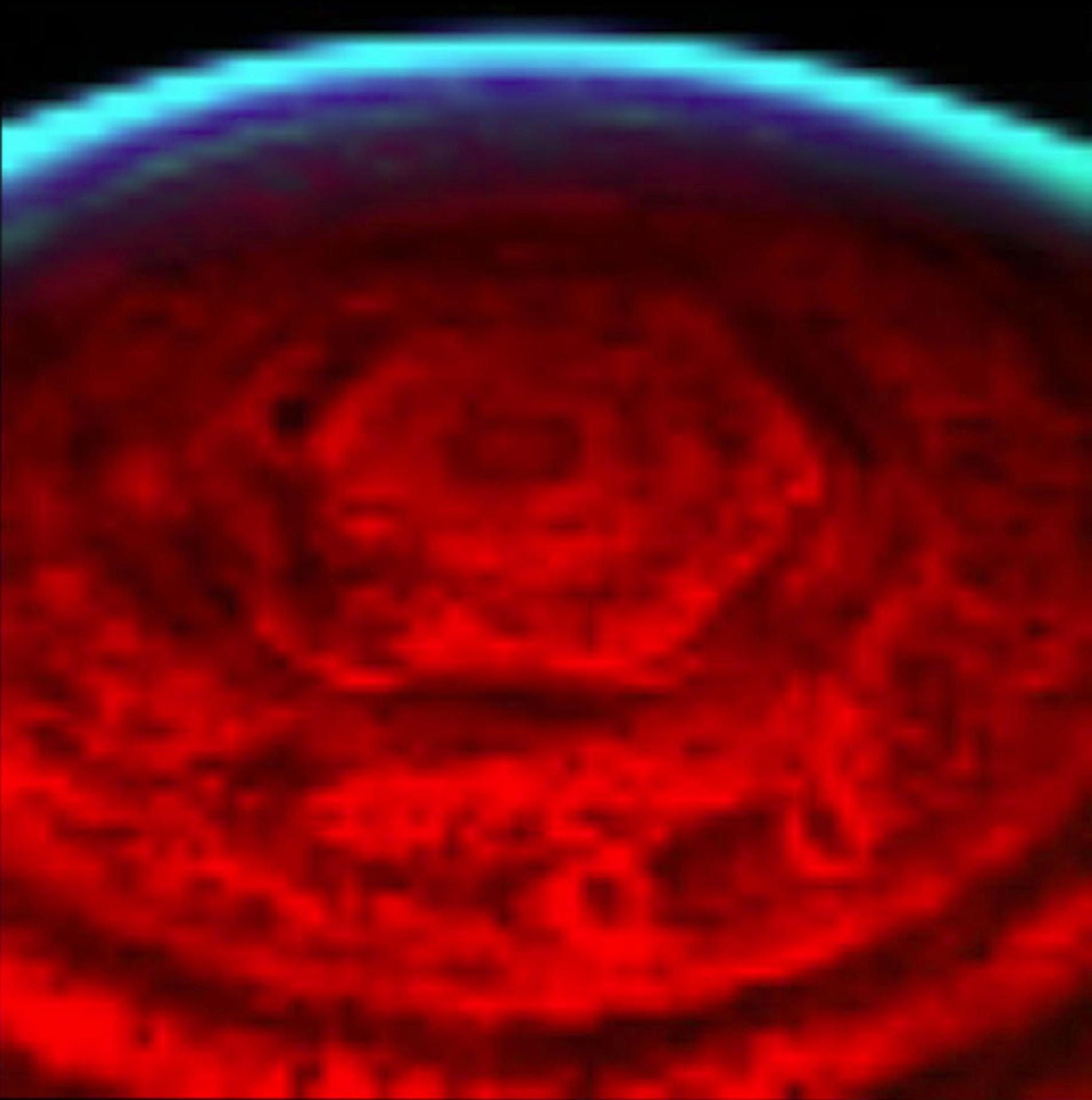 This nighttime view of Saturn north pole clearly shows a bizarre six-sided hexagon feature encircling the entire north pole. This is one of the first clear images taken of the north polar region ever acquired from a unique polar perspective