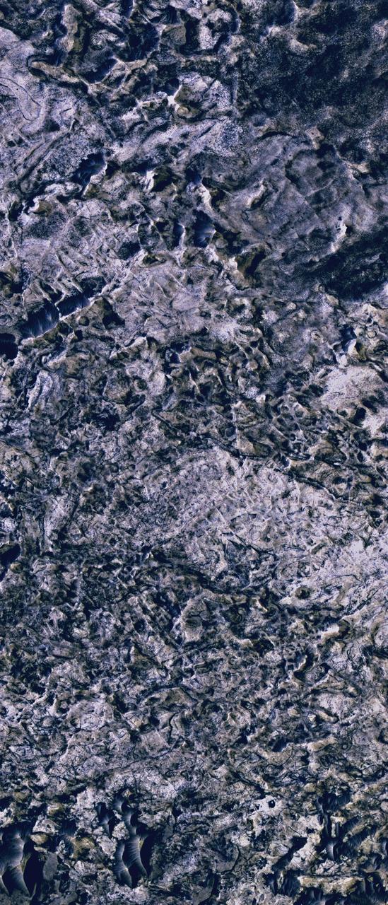 This image from the High Resolution Imaging Science Experiment camera on NASA Mars Reconnaissance Orbiter shows evidence for ancient fluid flow along fractures in Mars Meridiani Planum region