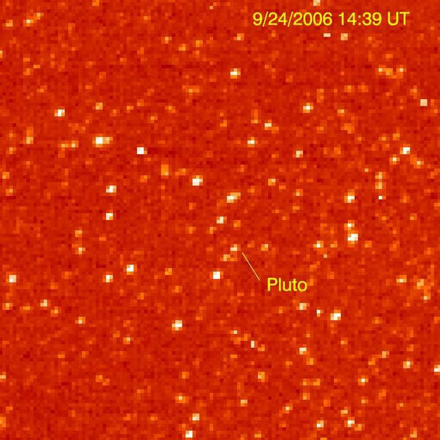 The Long Range Reconnaissance Imager on NASA New Horizons acquired images of the Pluto field three days apart in late September 2006, in order to see Pluto motion against a dense background of stars.