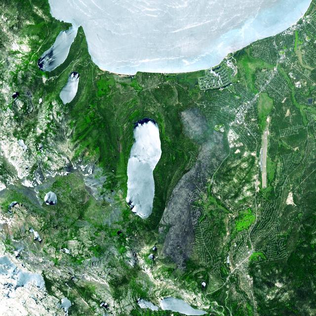 A destructive forest fire broke out June 24, 2007 near South Lake Tahoe, Calif. This image was acquired by NASA Terra on June 27, 2007.