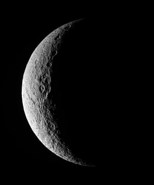 NASA image: Rhea Pitted Profile