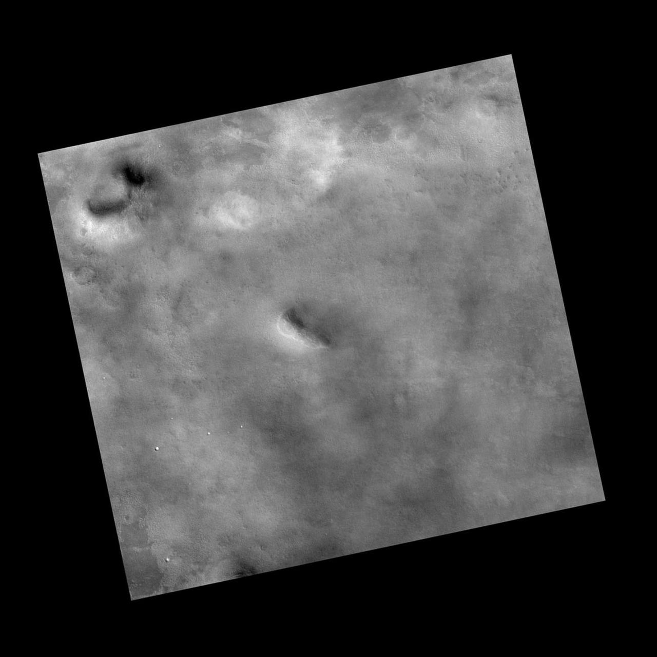 This view covers an area within the planned landing area for NASA Phoenix Mars Lander. It was taken by the Context Camera on NASA Mars Reconnaissance Orbiter.