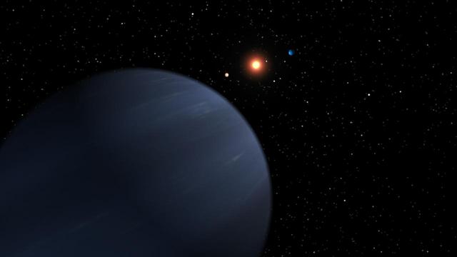 This artist concept shows four of the five planets that orbit 55 Cancri, a star much like our own. The most recently discovered planet, and the fourth out from the star, looms large in the foreground. 
