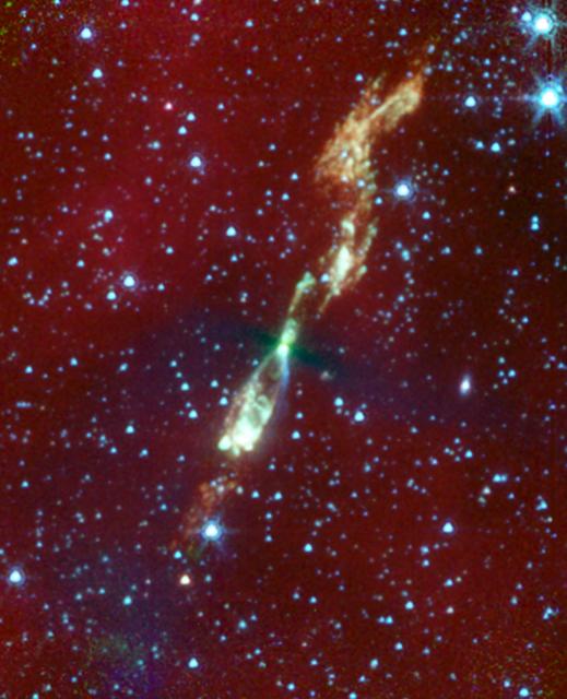A rare, infrared view of a developing star and its flaring jets taken by NASA Spitzer Space Telescope shows us what our own solar system might have looked like billions of years ago.