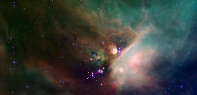 NASA image: Young Stars in Their Baby Blanket of Dust