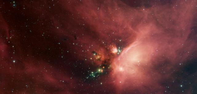 NASA image: Young Stars in Their Baby Blanket of Dust