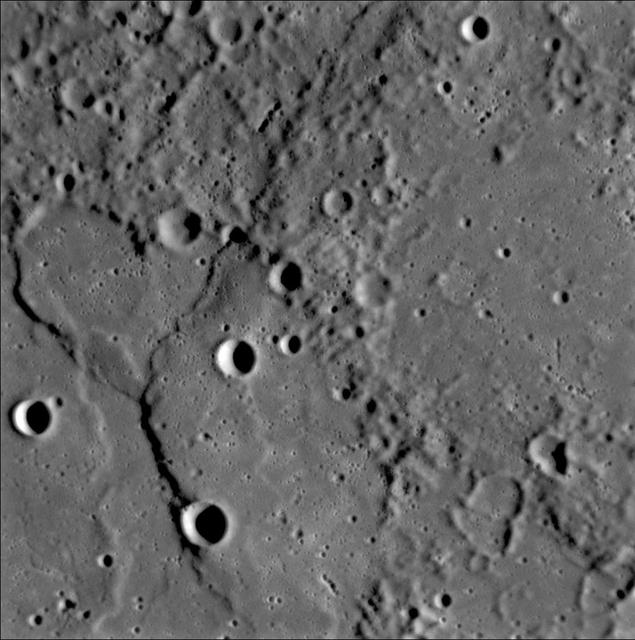 A complex history of geological evolution is recorded in this frame from the Narrow Angle Camera NAC, part of the Mercury Dual Imaging System MDIS instrument, taken during NASA MESSENGER close flyby of Mercury on January 14, 2008.