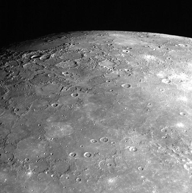 As NASA MESSENGER spacecraft sped by Mercury on January 14, 2008, the Narrow Angle Camera NAC of the Mercury Dual Imaging System MDIS captured this shot looking toward Mercury north pole. 