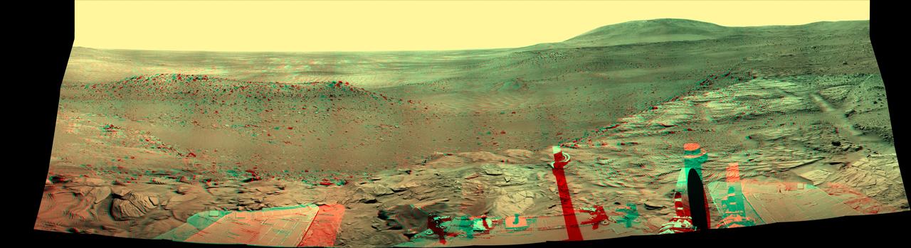NASAS Mars Exploration Rover Spirit captured this westward view from atop a low plateau where Sprit spent the closing months of 2007. 3D glasses are necessary to view this image.
