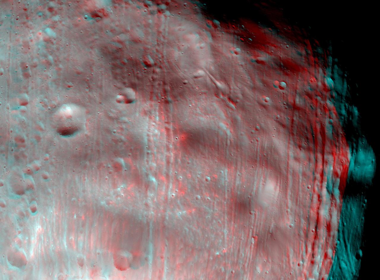 NASA Mars Reconnaissance Orbiter took two images of the larger of Mars two moons, Phobos, within 10 minutes of each other on March 23, 2008. 3D glasses are necessary to view this image.