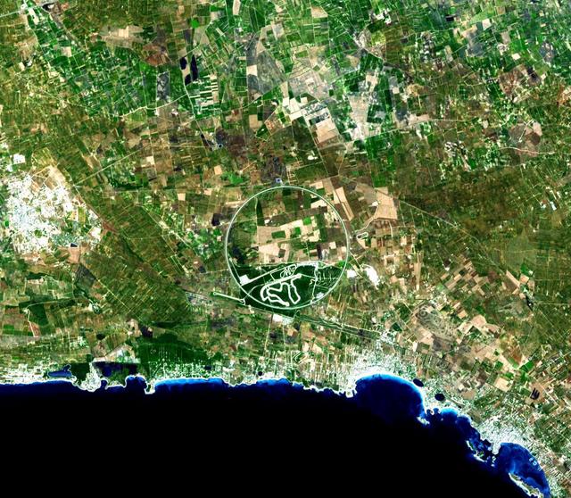 The Nardò Ring is a striking visual feature from space, and astronauts have photographed it several times. The Ring is a race car test track in Italy. This image was acquired by NASA Terra satellite on August 17. 2007.