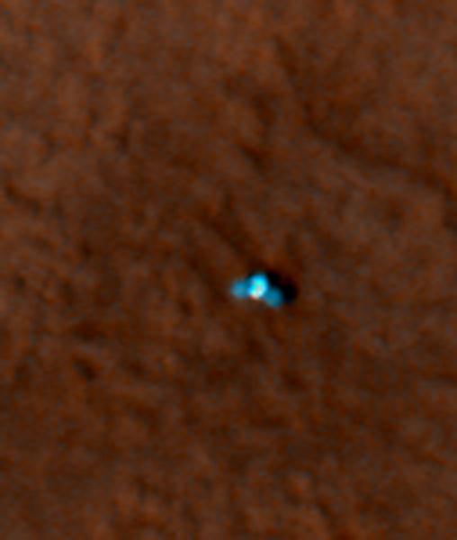 This is an enhanced-color image from Mars Reconnaissance Orbiter High Resolution Imaging Science Experiment HiRISE camera. It shows the NASA Mars Phoenix lander with its solar panels deployed on the Mars surface
