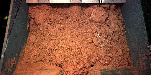 Martian Soil Inside Phoenix Robotic Arm Scoop