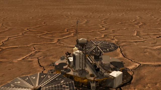 This is an image of a camera pushing through NASA Phoenix Mars Lander Stereo Surface Imager SSI.