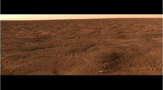 Images taken by NASA Phoenix Mars Lander Surface Stereo Imager, combined into a panoramic view looking north from the lander. 