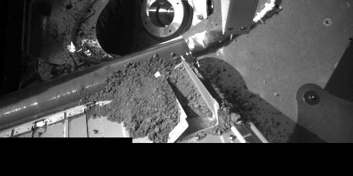 Robotic Arm Camera Image of the South Side of the Thermal and Evolved-Gas Analyzer Door TA4 receiving sample