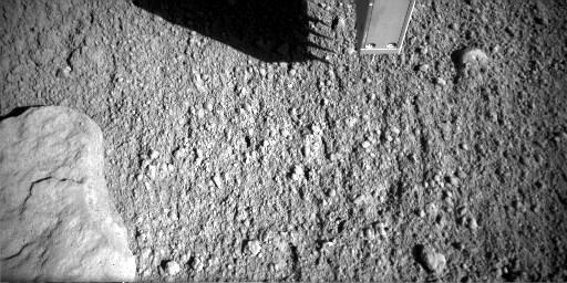This image shows the first time that the four spikes of the NASA Phoenix Mars Lander thermal and electrical conductivity probe were inserted into Martian soil.