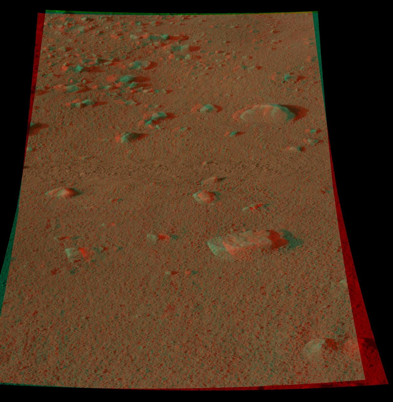 This colorglyph, acquired by NASA Phoenix Lander Surface Stereo Imager shows part of Phoenix workplace and is informally called Wonderland. 3D glasses are necessary to view this image.