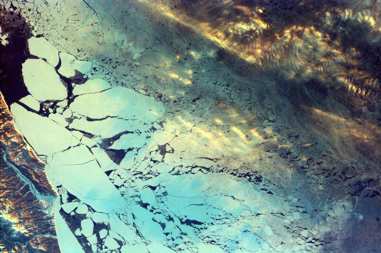 This image from NASA EarthKAM is of Sakhalin Island, located just north of Japan and east of the Khabarovski and Primorski Krai of the Russian Far East. With the Kuril Islands, it forms Sakhalin Province. 