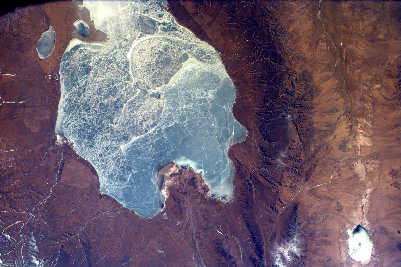 This image from NASA EarthKAM captures almost all of Quinghai, the largest lake in China. It is located in the Quinghai Province on the Quinghai Tibetan Plateau.